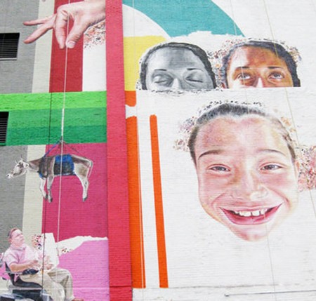 Pop Culture Paintings: The Kendall College mural features large contemporary pop culture and portraits. The paintings show real people from around the community. Photo courtesy of Terry Johnston Pop Culture Paintings: The Kendall College mural features large contemporary pop culture and portraits. The paintings show real people from around the community. Photo courtesy of Terry Johnston